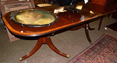 Lot 1224 - A reproduction mahogany, satinwood banded and boxwood strung twin-pedestal dining table in...