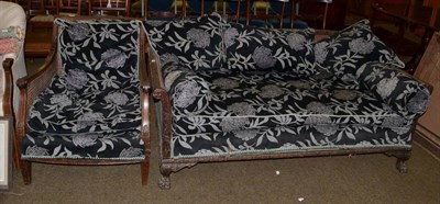 Lot 1235 - An early 20th century mahogany bergere settee and a single armchair