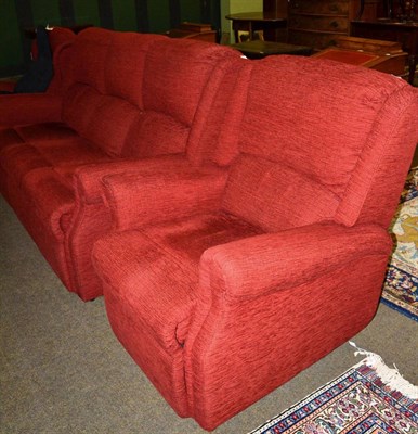 Lot 1240 - Red upholstered three piece suite with reclining armchair (3)