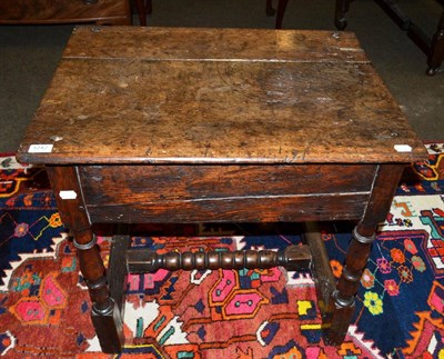 Lot 1242 - An oak side table with boldly turned stretcher, comprised of 17th and 18th century elements