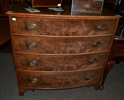 Lot 1244 - A 19th century bow fronted four height chest of drawers