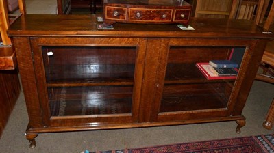 Lot 1251 - A glazed low bookcase