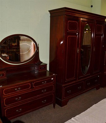 Lot 1261 - Edwardian string inlaid mahogany two piece bedroom suite comprising a wardrobe and dressing table