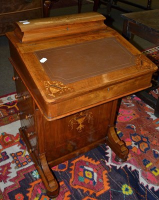 Lot 1266 - A Victorian walnut davenport