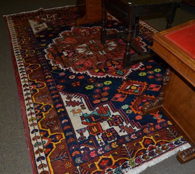 Lot 1282 - A Hamadan style rug, the central floral medallion surrounded by zoomorphic spandrels and conforming