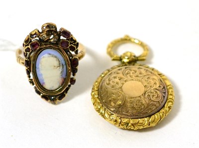 Lot 22 - A porcelain portrait miniature, garnet and diamonds set ring, an oval portrait miniature within...