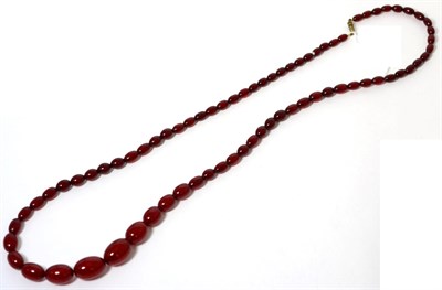 Lot 44 - A red bakelite bead necklace