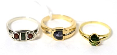 Lot 48 - An iolite and diamond ring, stamped '9ct', a green tourmaline ring, stamped '9ct' and a silver ring