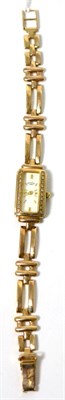Lot 51 - A lady's 9ct gold Rotary wristwatch on an integral 9ct gold strap