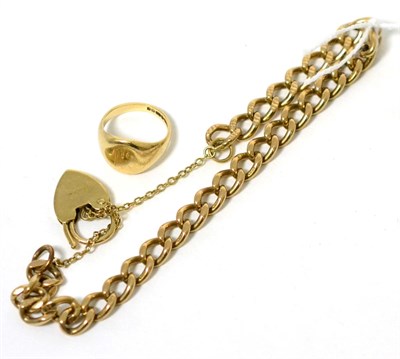 Lot 55 - A 9 carat gold curb link bracelet, with a 9 carat gold padlock clasp and a 9 carat gold signet...