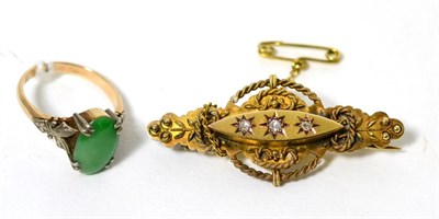 Lot 87 - A jade ring, stamped '18ct' and a 15 carat gold diamond set Victorian brooch (2)