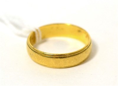 Lot 96 - A 22 carat gold band ring