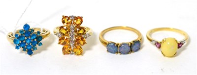 Lot 104 - A 9 carat gold blue apatite ring, finger size N1/2, a 9 carat gold opal, tourmaline and diamond...