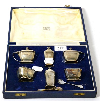 Lot 133 - A six piece silver cruet set by Garrard & Co, Birmingham, 1954, cased (two spoons missing)