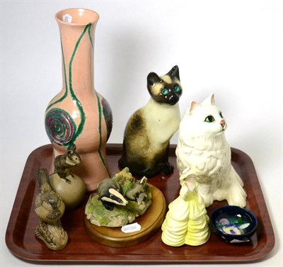 Lot 142 - A Moorcroft Orchid pattern pin dish; a Beswick cat; model 1867; a Winstanley cat; a Border Fine Art