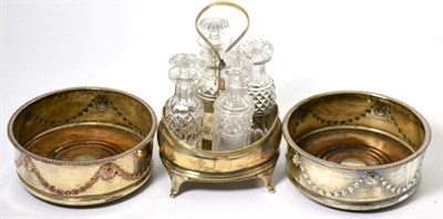 Lot 162 - A George III silver bottle cruet, together with a pair of later plated bottle coasters with...