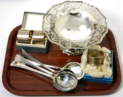 Lot 176 - A set of six silver soup spoons; a silver pierced comport; a pair of napkin rings by A E Jones; and