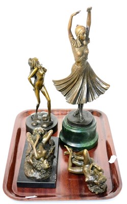 Lot 177 - A reproduction bronzed figure and three erotic figures