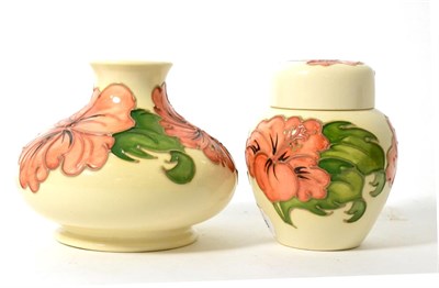 Lot 184 - Walter Moorcroft coral Hibiscus vase and ginger jar and cover, on a white ground (2)