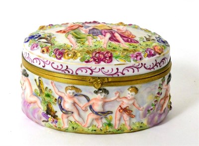 Lot 188 - A Capodimonte style oval casket, relief decoration, gilt mounts