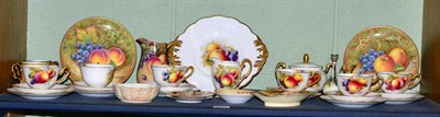 Lot 208 - A fruit painted porcelain tea service by Richard Budd; together with a pair of fruit painted plates