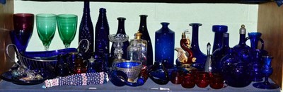 Lot 214 - A shelf of assorted 19th century and later coloured glass