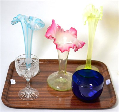 Lot 232 - Three Jack in the pulpit vaseline vases, a blue bowl and one large wine glass