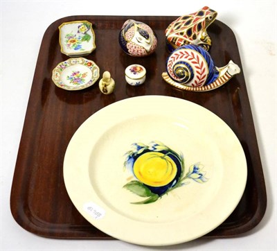 Lot 241 - A Moorcroft pottery plate; three Royal Crown Derby china paperweights (lacking stoppers); two...