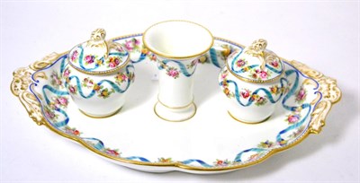 Lot 246 - A porcelain inkstand with foliate and ribbon border