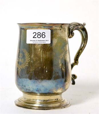 Lot 286 - A George III silver pint mug