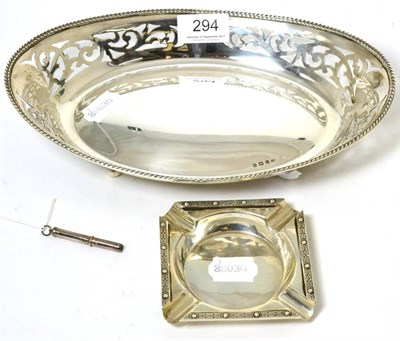 Lot 294 - A silver pierced dish, by W.A. Birmingham, 1932 of navette form with ball feet; together with a...