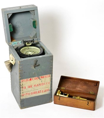 Lot 308 - A 19th century botanist's microscope, cased; and a type 06A military bubble compass, cased (2)