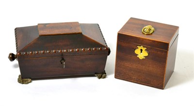 Lot 311 - An early 19th century tea caddy and a Victorian mahogany box