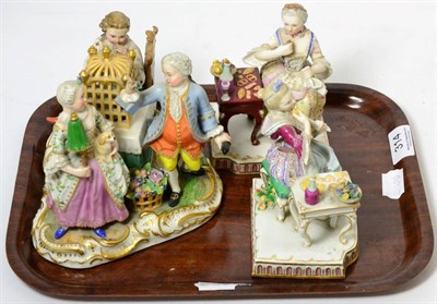 Lot 314 - A Meissen porcelain figure of a girl seated by a table (cracked and re-stuck), a similar figure...