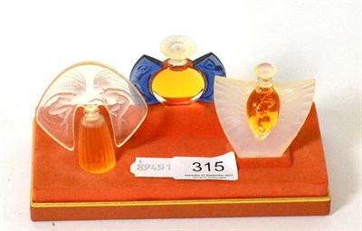 Lot 315 - A set of three Lalique perfumes