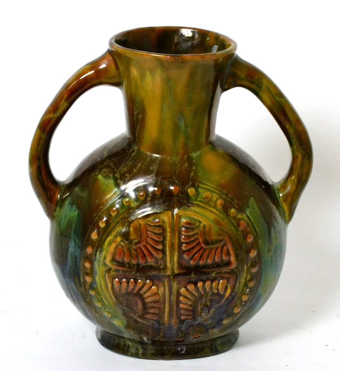 Lot 320 - A Linthorpe pottery twin handled vase, shape no. 337, designed by Christopher Dresser