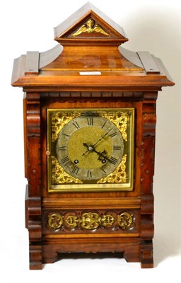 Lot 329 - A Victorian walnut quarter striking table clock, movement back plate stamped RMS