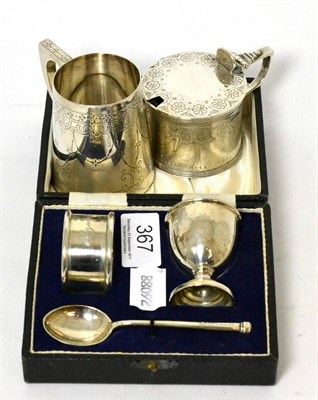 Lot 367 - Silver christening set, cased, a Christening mug and a mustard pot