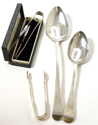 Lot 370 - Two Georgian silver spoons, two sugar tongs and 'sterling' cocktail stirrer