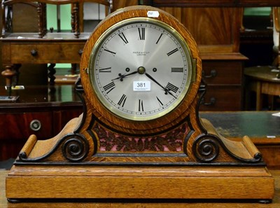 Lot 381 - An oak bracket clock, Maple & Co Ltd