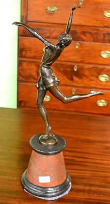 Lot 386 - A reproduction bronzed figure of a female