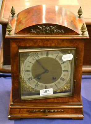 Lot 387 - A walnut cased bracket clock