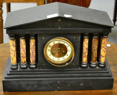 Lot 395 - A Victorian black slate striking mantel clock