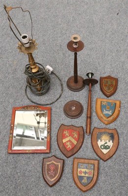 Lot 1007 - A pair of turned candlesticks, a lacquered framed mirror, six painted armorial shields and a...