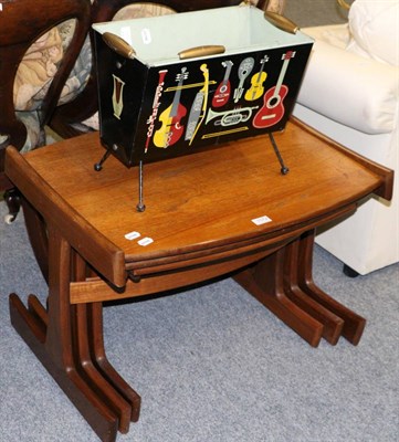 Lot 1072 - A G plan teak nest of tables and a Worcester ware magazine rack