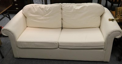 Lot 1073 - Cream upholstered sofa bed