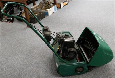 Lot 1076 - Cylinder petrol lawn mower with scarifier attachment