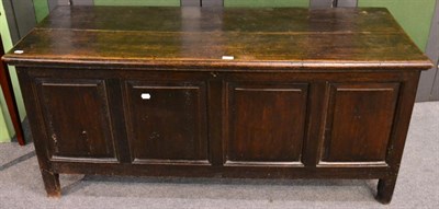 Lot 1126 - A 18th century four panel oak coffer