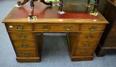 Lot 1138 - Early 20th century leather inset oak pedestal desk