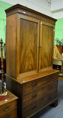 Lot 1139 - A George III mahogany linen press